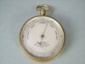 Appraisal: A late th century brass cased pocket barometer with silvered