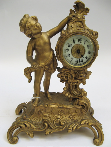 Appraisal: AMERICAN VICTORIAN GILT METAL SCULPTURE CLOCK manufactured by Ansonia Clock