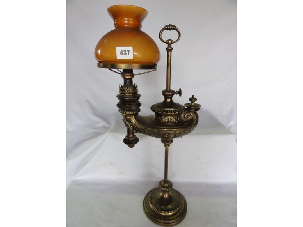 Appraisal: A Victorian cast brass student's oil lamp with adjustable column