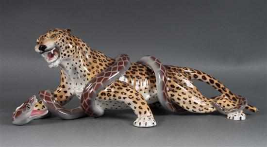 Appraisal: Ronzan ceramic figural group of a python and a leopard