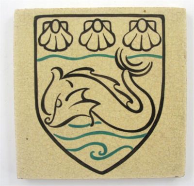 Appraisal: A Carter's Poole Pottery tile decorated with the Poole coat