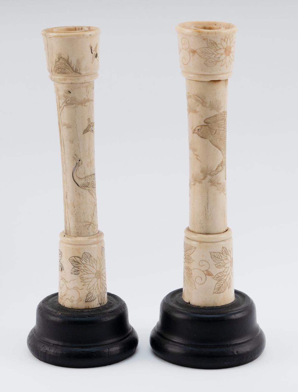 Appraisal: PAIR OF JAPANESE TURNED AND ENGRAVED BONE CANDLESTICKS MEIJI PERIOD