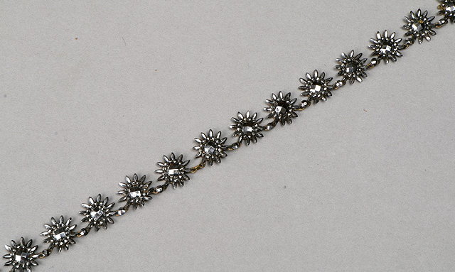 Appraisal: A GEORGIAN CUT STEEL NECKLACE in the form of flowers