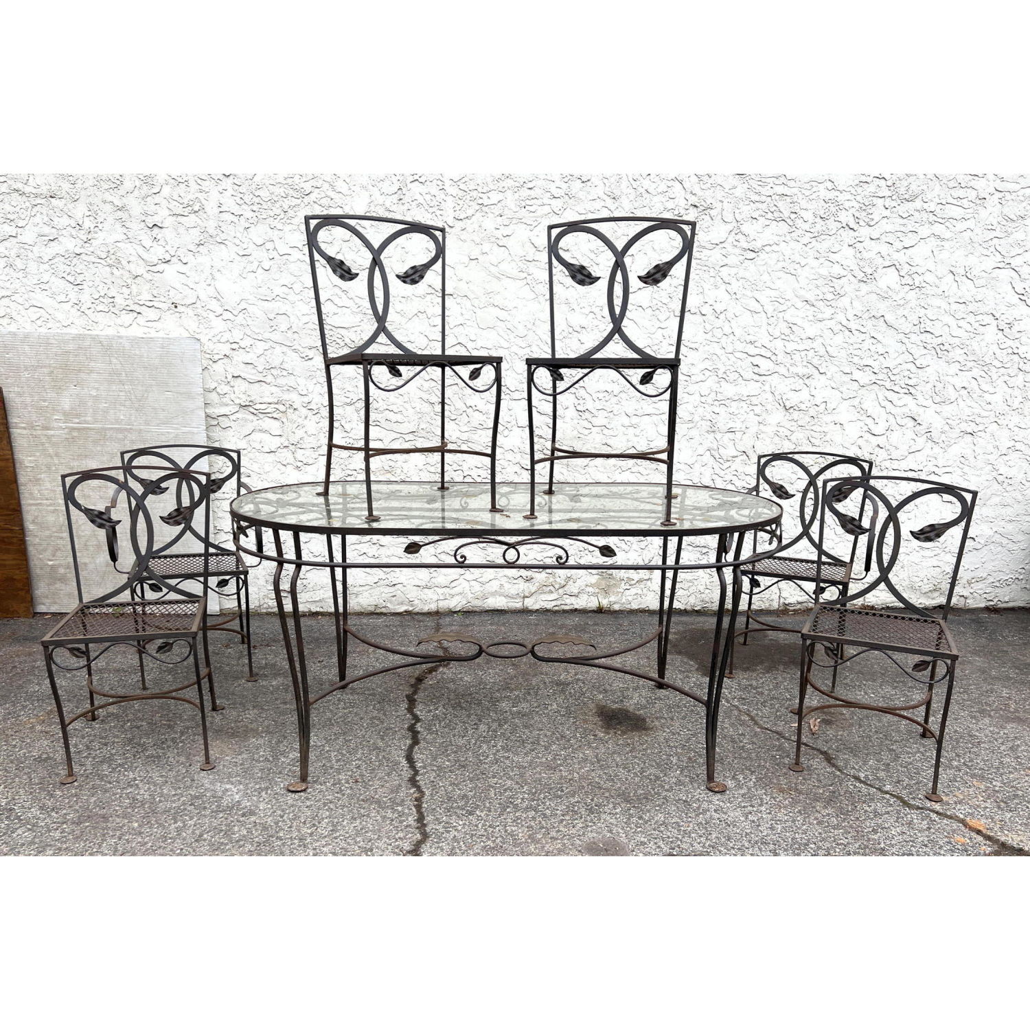 Appraisal: Wrought Iron Dining Patio Set Curved Hammered Leaf Design Oval