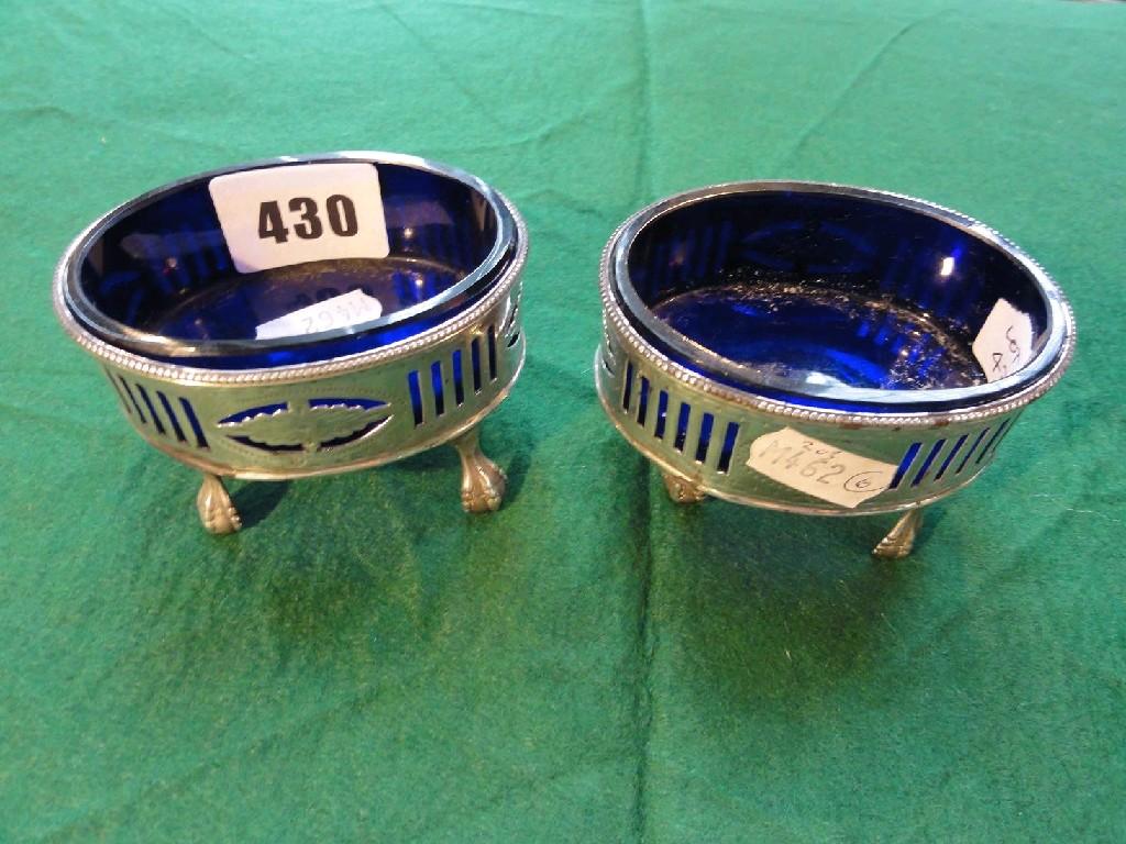 Appraisal: A pair of Georgian silver salts of oval form with