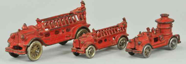 Appraisal: LOT OF THREE FIRE PUMPERS Cast iron painted in red