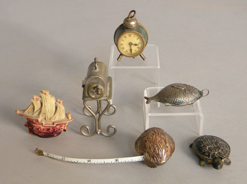 Appraisal: Group of six figural sewing tape measures late th early