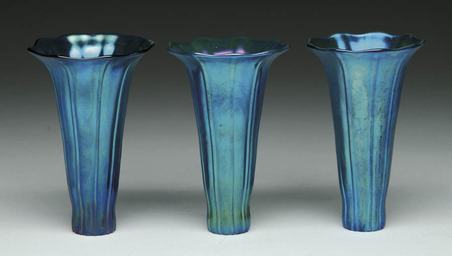 Appraisal: THREE CONTEMPORARY LILY SHADES Vertically ribbed blue lily shades are