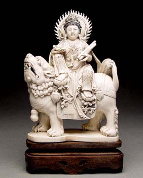 Appraisal: IVORY GUANYIN SEATED ON KYLIN Very elaborately carved old Chinese