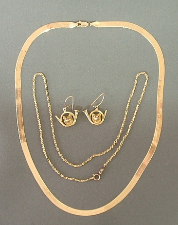 Appraisal: - Two k y g necklaces to incl herringbone and