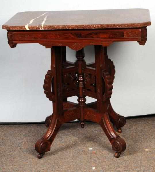 Appraisal: Victorian Brown Marble Top Table Condition Excellent Size x x