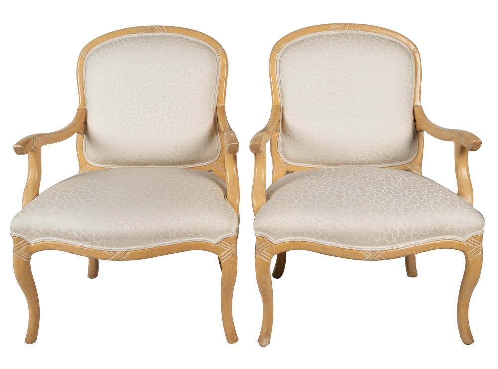 Appraisal: PAIR OF A RUDIN BLONDE WOOD ARMCHAIRSwith manufacturer's tags covered