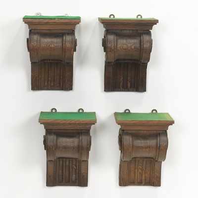 Appraisal: Four Carved Wood Brackets Medium tone wood architectural brackets with