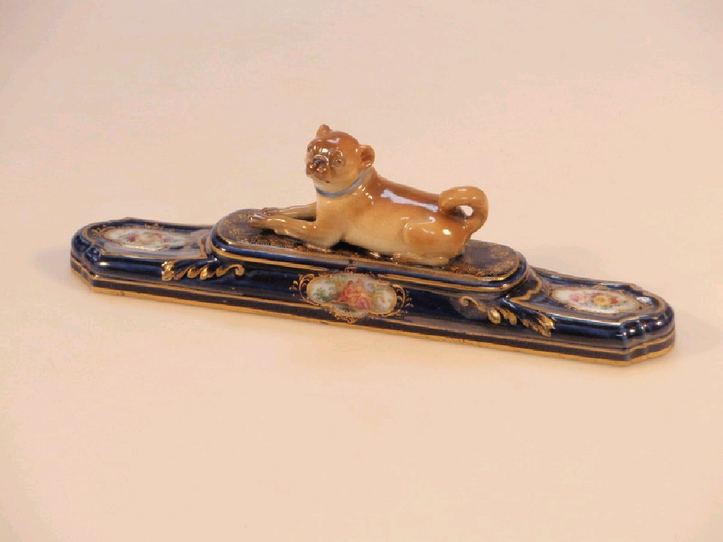 Appraisal: A late thC Meissen desk weight modelled as a pug