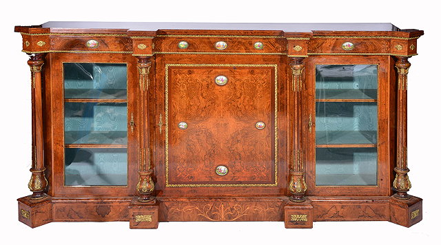 Appraisal: A VICTORIAN FIGURED WALNUT SIDE CABINET the central cupboard enclosed