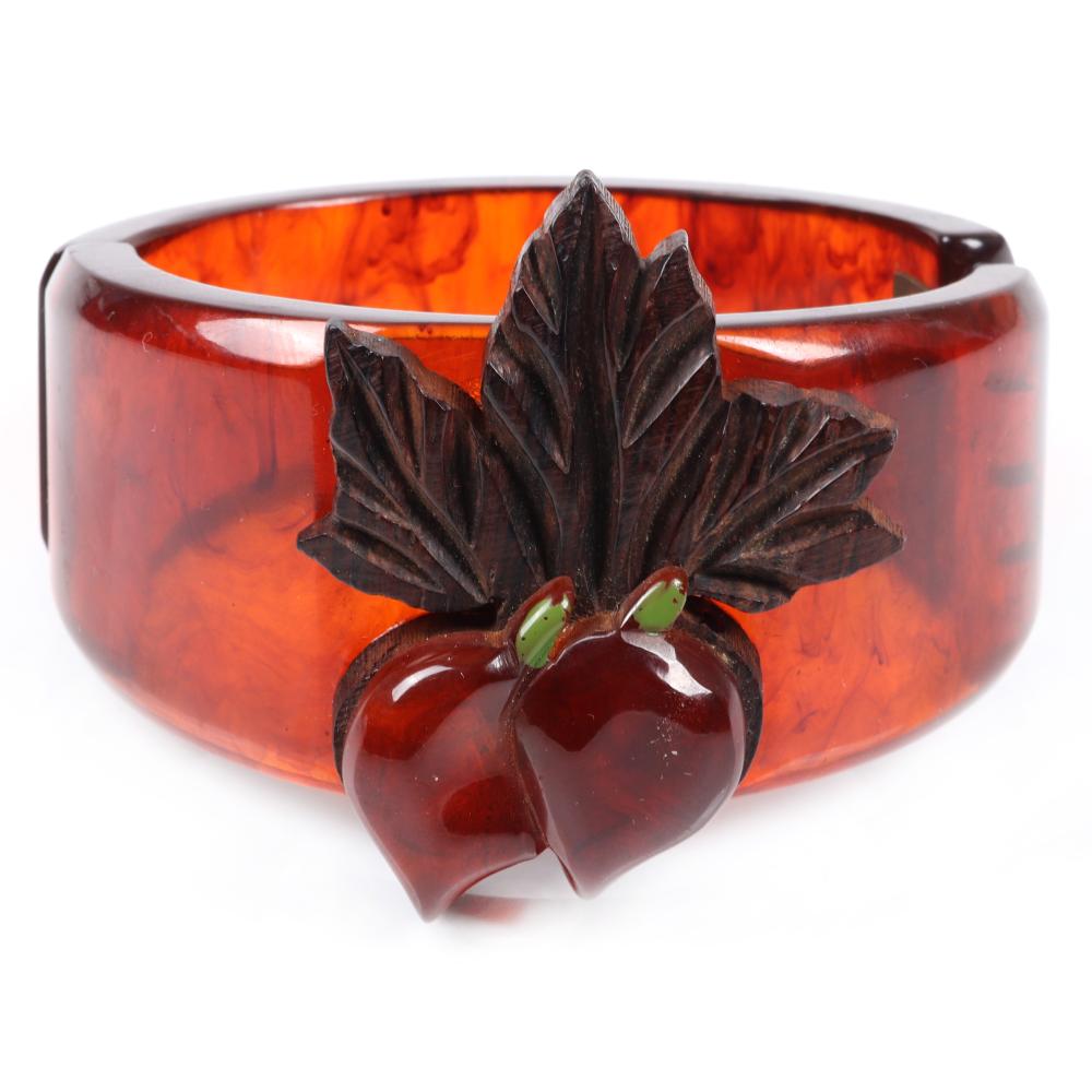 Appraisal: BAKELITE WIDE VEGETABLE MOTIF CLAMPER CUFF BRACELET IN ROOTBEER SWIRL