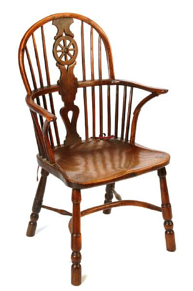 Appraisal: An English windsor mixed wood armchair height in width in