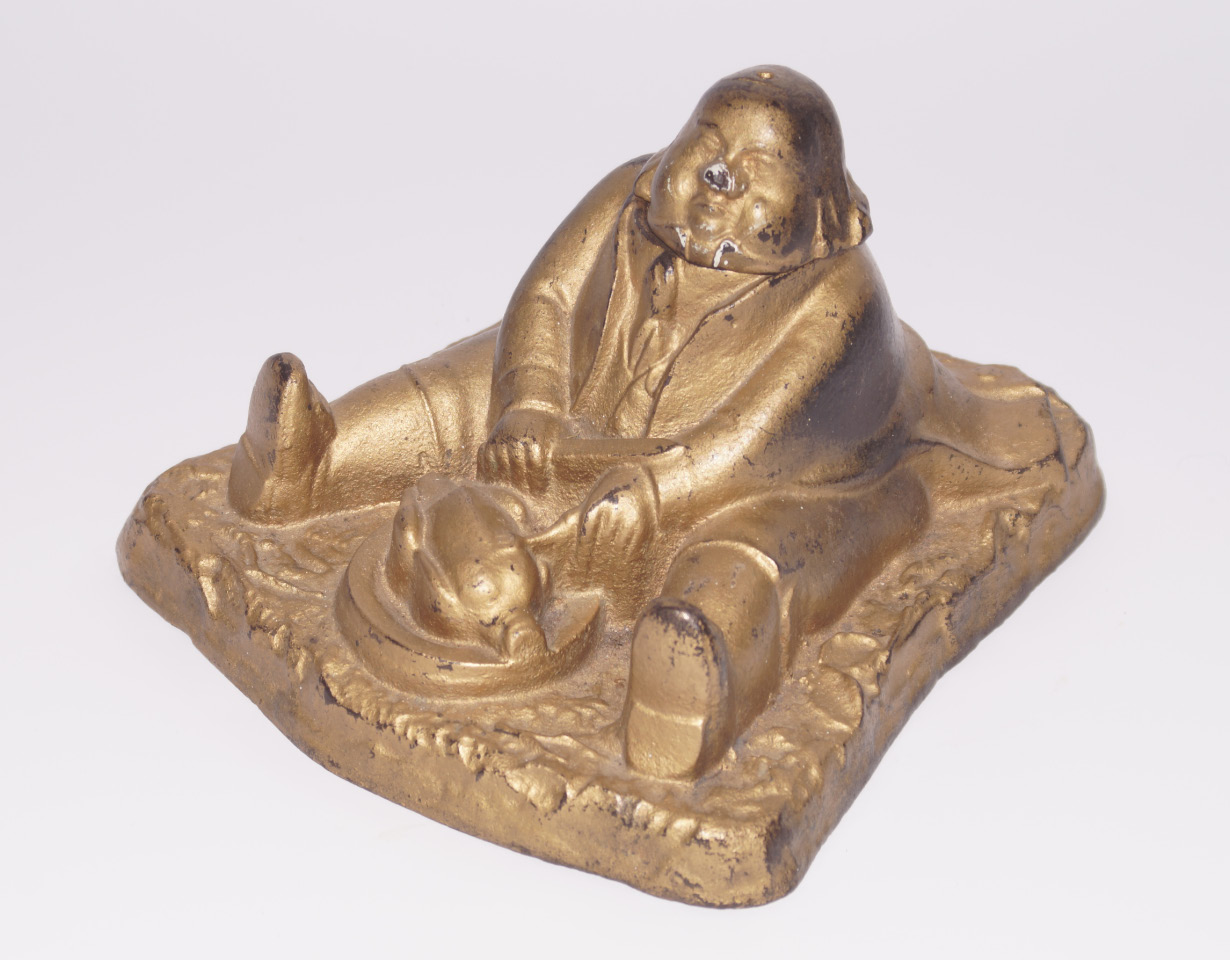 Appraisal: A Victorian inkstand featuring gentleman butchering fowl with hinged head