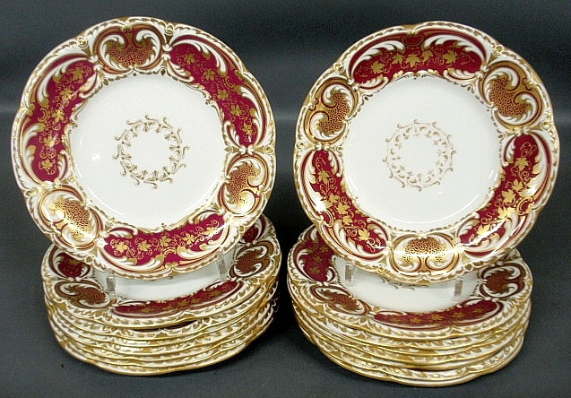 Appraisal: - Sixteen Davenport plates with intricate maroon and gilt borders