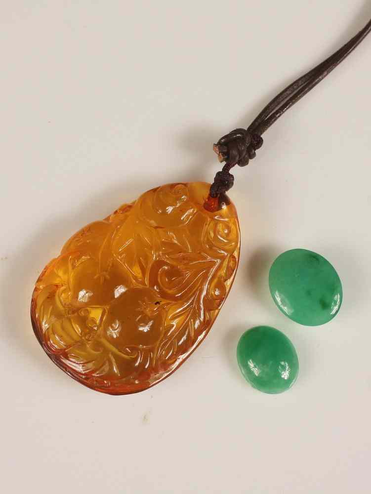 Appraisal: AMBER PENDANT JADE PELLETS - Amber Pendant carved with bat