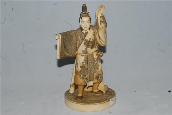 Appraisal: JAPANESE IVORY FIGURE A male court dancer wearing an elaborately