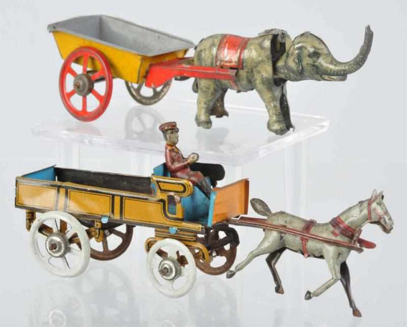 Appraisal: Lot of Tin Litho Animal Driven Carts German Includes one