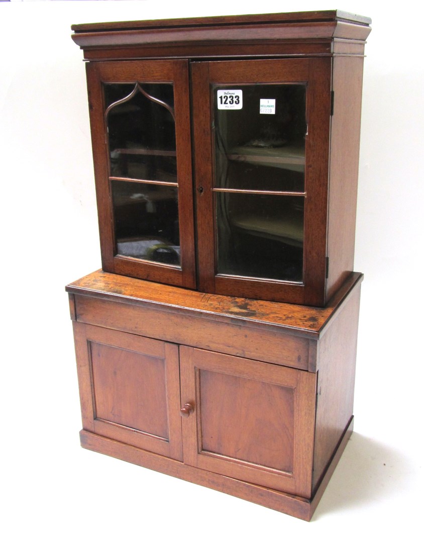 Appraisal: A th century miniature mahogany display cabinet cupboard on plinth