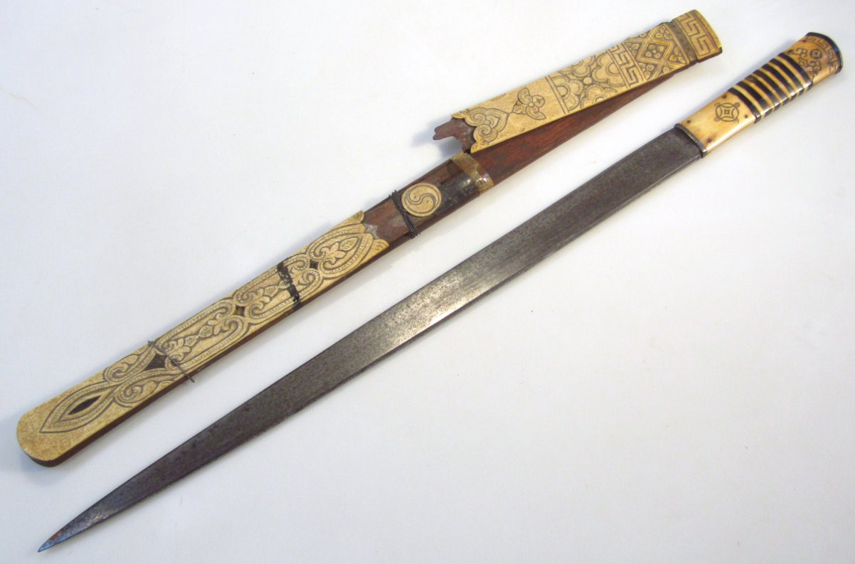 Appraisal: A thC Middle Eastern dagger with cm tapering blade and