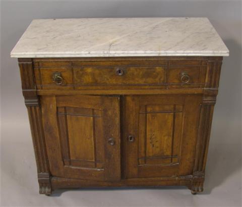 Appraisal: VICTORIAN WHITE MARBLE TOP CABINET molded carrera marble top over