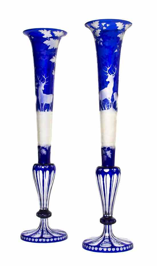 Appraisal: Two Bohemian Glass Trumpet Vases each in blue cut to