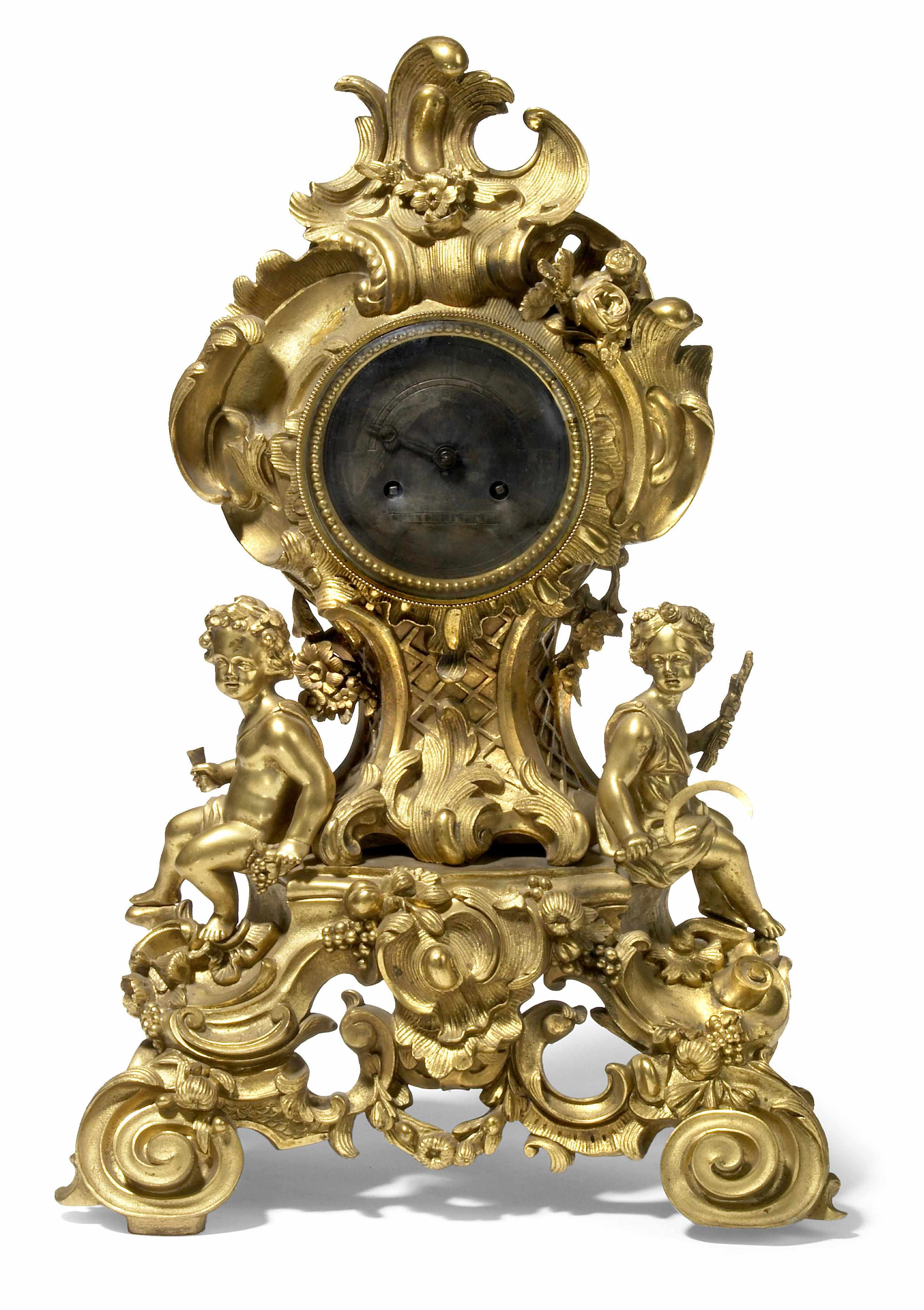 Appraisal: A French gilt bronze mantel clock mid th century The