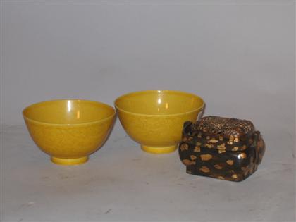 Appraisal: Pair of Chinese yellow glaze bowls and simulated gold splash