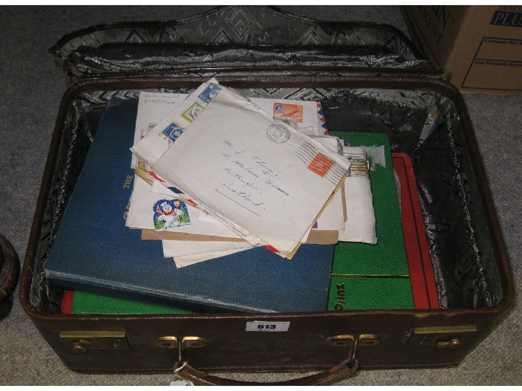 Appraisal: Suitcase containing postcards stamps etc