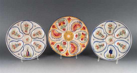 Appraisal: Henriot Quimper faience oyster plate and a pair of Caen