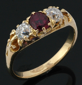 Appraisal: An Antique three stone ruby and diamond ring The oval