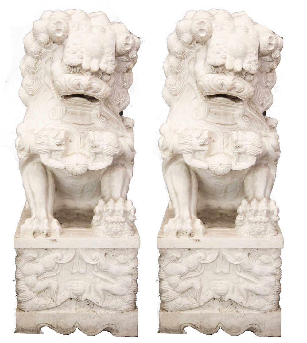 Appraisal: PAIR OF CHINESE CARVED MARBLE TEMPLE LIONSCondition white paint over