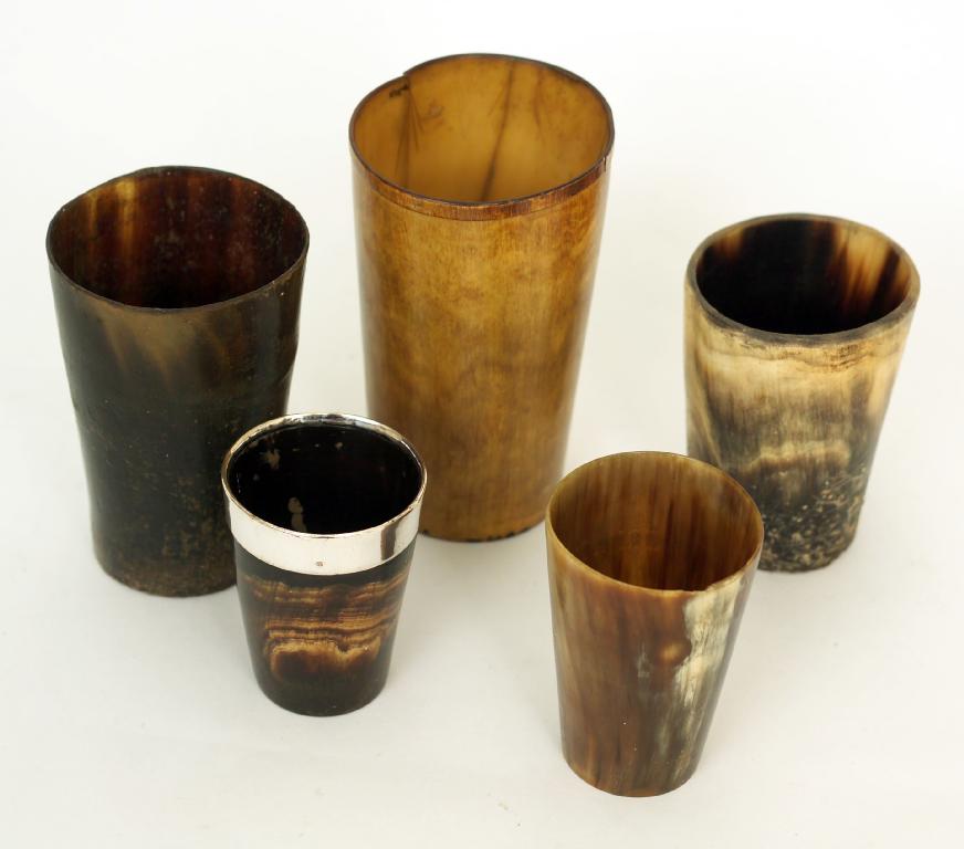 Appraisal: GROUP OF FIVE th CENTURY HORN BEAKERS Tallest cm -