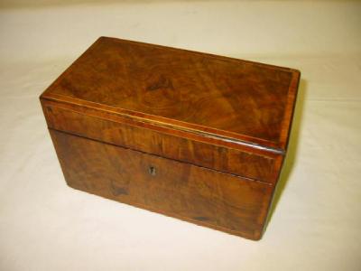 Appraisal: A VICTORIAN BURR WALNUT TEA CADDY of oblong form with