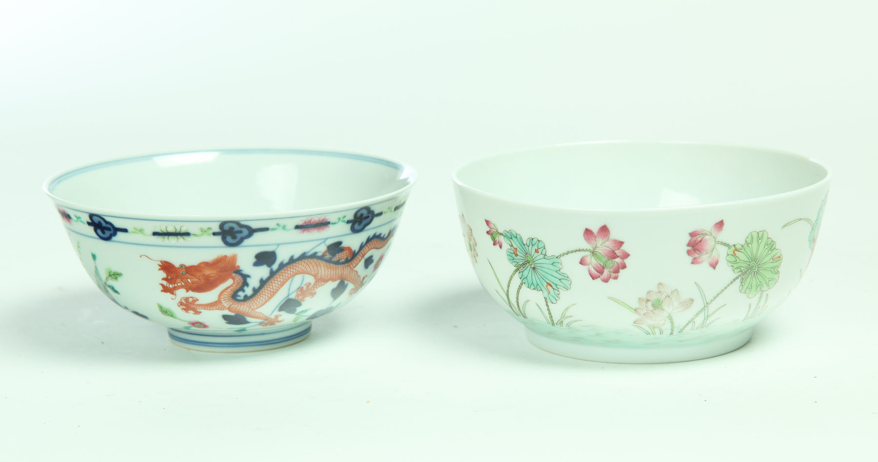 Appraisal: TWO EXPORT-STYLE BOWLS China th century Dragons and phoenix with