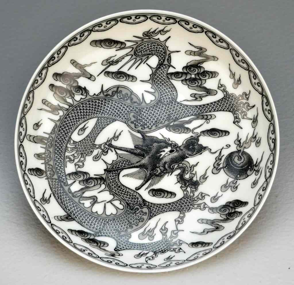 Appraisal: Chinese Black White Porcelain PlateThe interior finely painted to depict