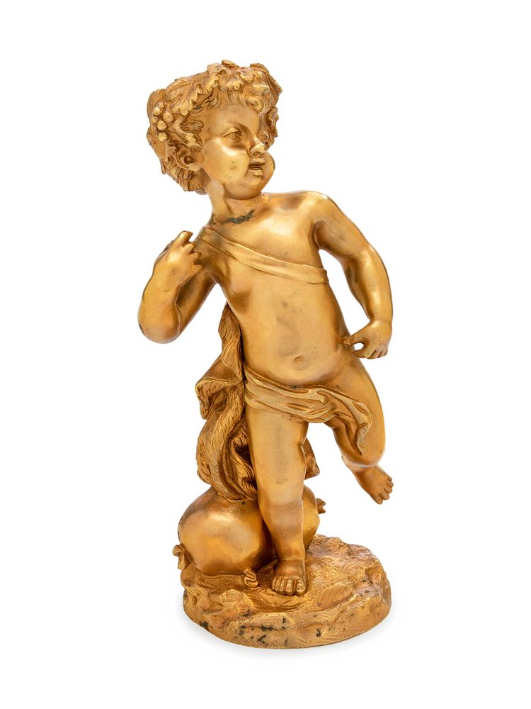 Appraisal: A Continental Gilt Bronze Figure of a Bacchic Putto A