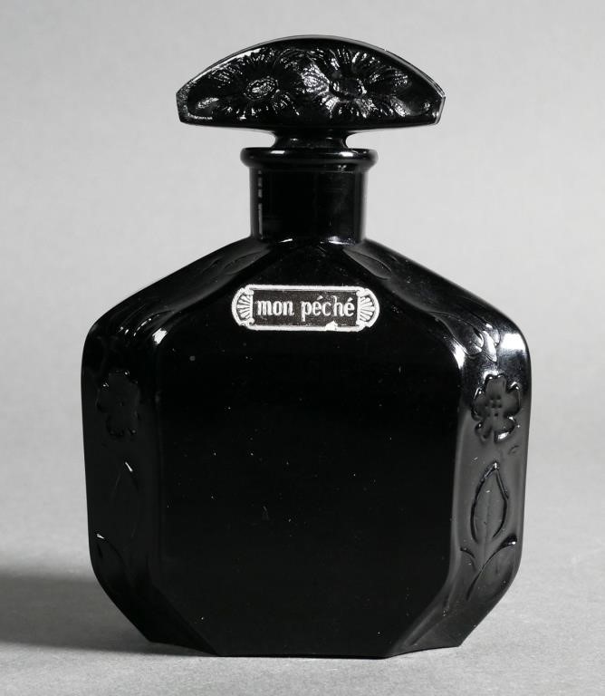 Appraisal: Mon Peche Poiret black glass perfume bottle with a floral