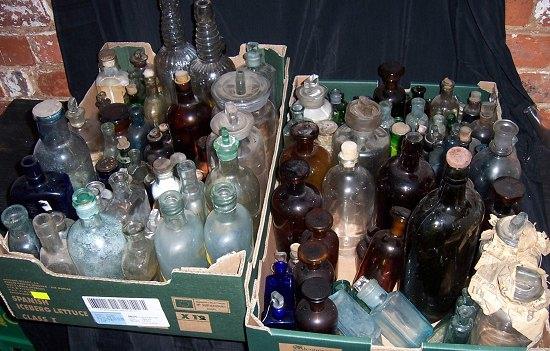 Appraisal: Two bottles with ring turned necks and marked 'Poisonous' cm