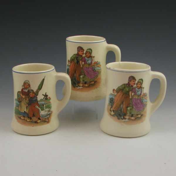 Appraisal: Three Roseville Dutch Creamware mugs Unmarked Each has some flaw