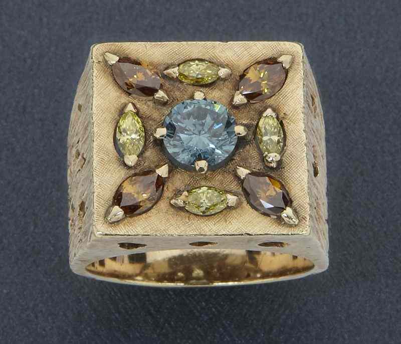 Appraisal: Retro gents K gold blue diamond ringhaving an intense fancy