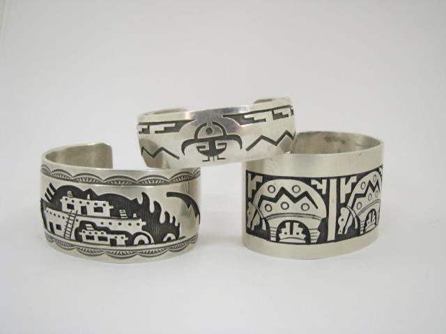 Appraisal: Group of three Southwest silver cuff bracelets including wide with