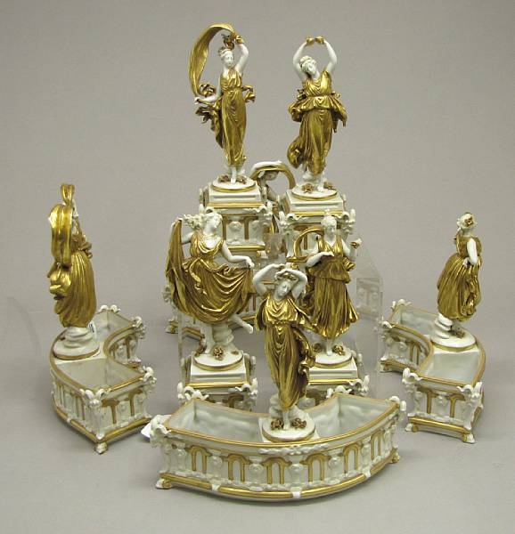 Appraisal: A German porcelain gilt decorated twelve piece table center second