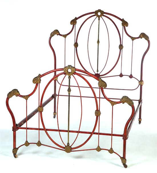 Appraisal: CAST IRON BED American late th century Scrolled head and