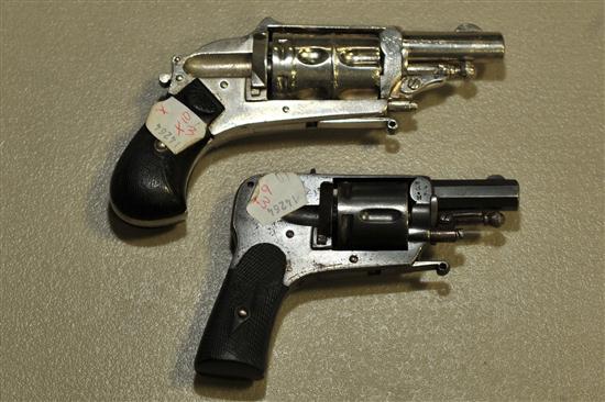 Appraisal: TWO REVOLVERS Belgian ''bicycle'' type revolvers hammerless with collapsable triggers