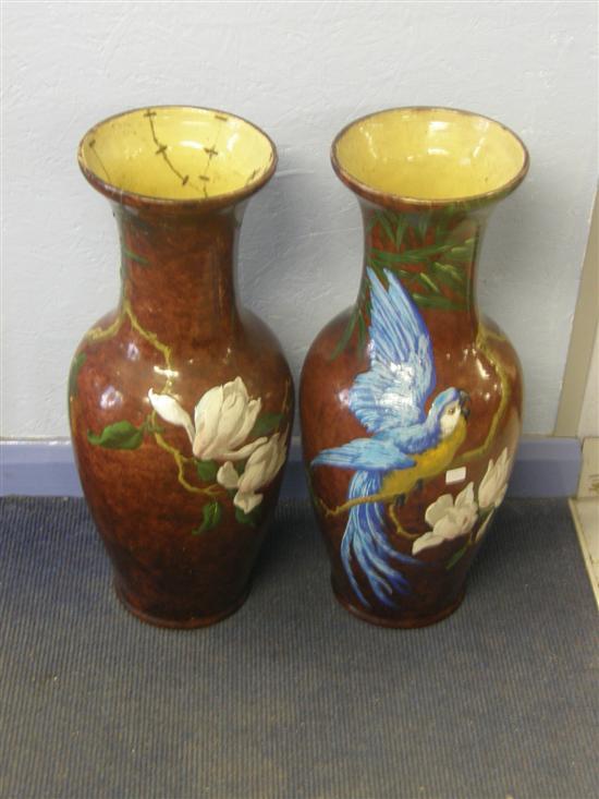 Appraisal: Pair of Victorian baluster vases painted with parrots perched on